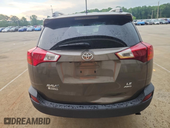 2015 Toyota RAV4 LE with VIN 2T3BFREV9FW391217, listed as a Copart auction lot 61019525 with 84,908 mi miles and Salvage title. Bid and sale history available at DreamBid. Image 6.