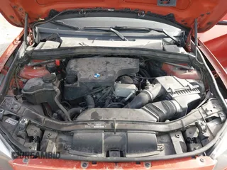 2014 BMW X1 sDrive28i with VIN WBAVM1C50EVW53376, listed as a IAAI auction lot 41838580 with 114,054 mi miles. Bid and sale history available at carsss.com. Image 10.