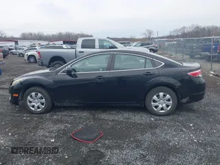 2009 Mazda 6 i Sport with VIN 1YVHP81HX95M46457, listed as a IAAI auction lot 41684501 with 132,299 mi miles and . Bid and sale history available at carsss.com. Image 14.