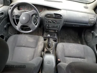 2003 Dodge Neon SE with VIN 1B3ES26C63D229990, listed as a Copart auction lot 75457134 with 178,329 mi miles and Salvage Title. Bid and sale history available at carsss.com. Image 8.