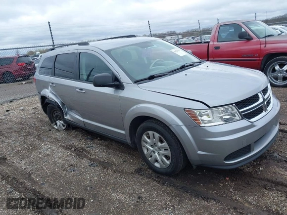 2016 Dodge Journey SE with VIN 3C4PDCAB4GT230643, listed as a IAAI auction lot 39127555 with 102,756 mi miles. Bid and sale history available at carsss.com. Image 1.