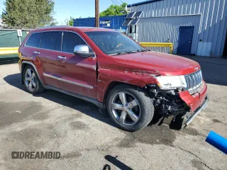 2011 Jeep Grand Cherokee Overland with VIN 1J4RR6GT8BC606688, listed as a Copart auction lot 57182295 with 100,423 mi miles and Salvage title. Bid and sale history available at DreamBid. Image 4.