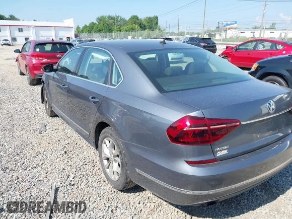 2017 Volkswagen Passat S with VIN 1VWAT7A35HC076253, listed as a IAAI auction lot 42594657 with 121,103 mi miles and . Bid and sale history available at DreamBid. Image 3.