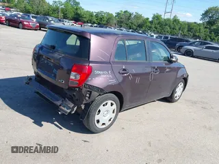 2014 Scion xD with VIN JTKKUPB48E1045154, listed as a IAAI auction lot 42240892 with 98,322 mi miles and . Bid and sale history available at DreamBid. Image 4.