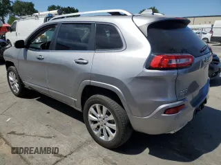 2017 Jeep Cherokee Overland z VIN 1C4PJMJS1HW588812, wystawiony jako Copart lot #58182885 z przebiegiem 77 794 mil mil oraz Szkoda całkowita • Salvage title. Historia ofert i sprzedaży dostępna na DreamBid. Obrazek 2.
