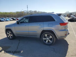 2014 Jeep Grand Cherokee Overland with VIN 1C4RJFCG0EC542527, listed as a Copart auction lot 51776655 with 167,703 mi miles and Salvage Title. Bid and sale history available at DreamBid. Image 2.