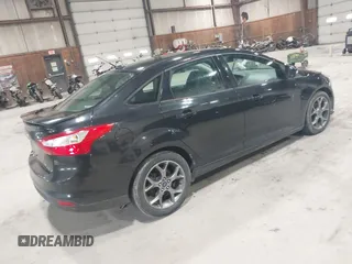 2014 Ford Focus SE with VIN 1FADP3F20EL114485, listed as a IAAI auction lot 41988373 with 119,963 mi miles. Bid and sale history available at carsss.com. Image 4.