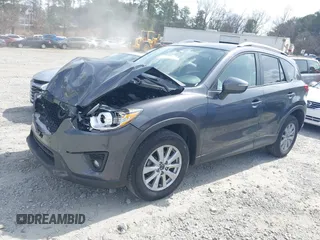 2015 Mazda CX-5 Touring with VIN JM3KE2CY2F0530204, listed as a IAAI auction lot 41788921 with 50,827 mi miles. Bid and sale history available at carsss.com. Image 18.