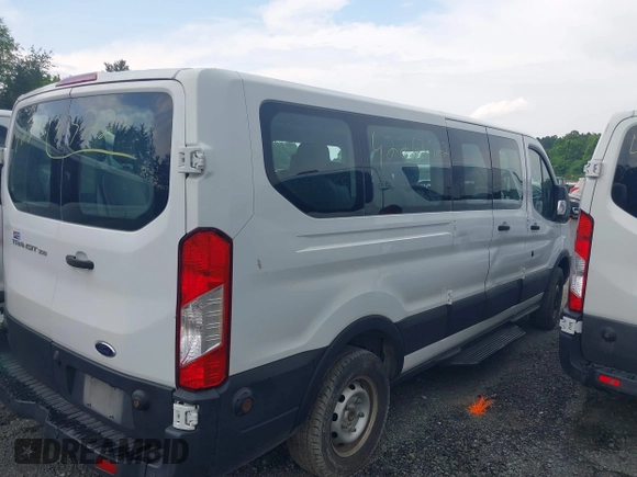 2019 Ford Transit Passenger XL z VIN 1FBZX2ZM8KKA34929, wystawiony jako IAAI lot #42263522 z przebiegiem 376 862 mil mil oraz . Historia ofert i sprzedaży dostępna na DreamBid. Obrazek 13.