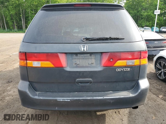 2004 Honda Odyssey EX-RES z VIN 5FNRL188X4B115002, wystawiony jako Copart lot #57883945 z przebiegiem Nie podano mil oraz Szkoda całkowita • Salvage title. Historia ofert i sprzedaży dostępna na DreamBid. Obrazek 6.