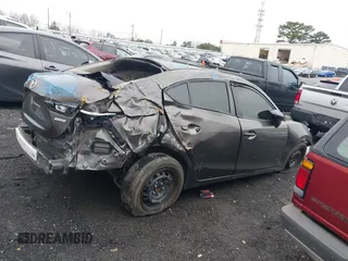 2014 Mazda 3 i SV with VIN JM1BM1T7XE1149383, listed as a IAAI auction lot 41236518 with Not Provided miles and . Bid and sale history available at DreamBid. Image 12.