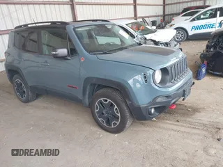 2017 Jeep Renegade Trailhawk z VIN ZACCJBCB4HPG53052, wystawiony jako IAAI lot #42012444 z przebiegiem 117 269 mil mil oraz . Historia ofert i sprzedaży dostępna na DreamBid. Obrazek 1.