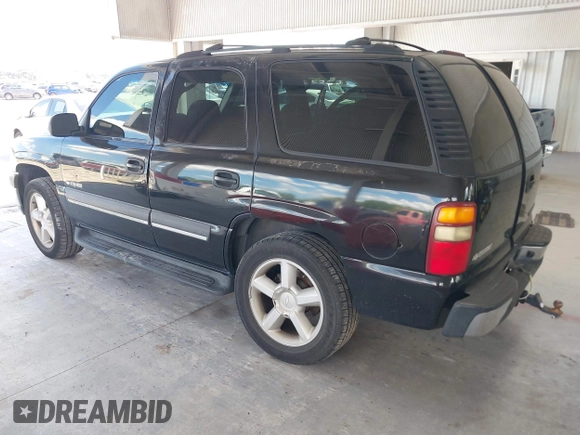 2003 Chevrolet Tahoe LS with VIN 1GNEC13V13R221799, listed as a IAAI auction lot 42488553 with 264,600 mi miles and . Bid and sale history available at DreamBid. Image 3.