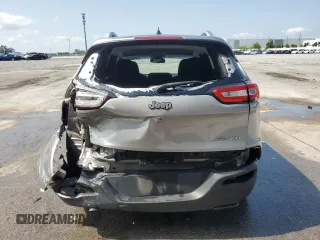 2015 Jeep Cherokee Sport z VIN 1C4PJLAB9FW731898, wystawiony jako Copart lot #55966565 z przebiegiem 114 137 mil mil oraz Szkoda całkowita • Salvage title. Historia ofert i sprzedaży dostępna na DreamBid. Obrazek 6.