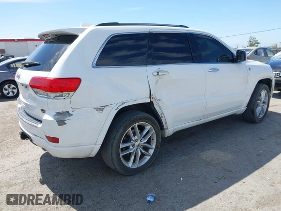 2015 Jeep Grand Cherokee Overland with VIN 1C4RJFCG3FC230185, listed as a IAAI auction lot 42494650 with 123,128 mi miles and . Bid and sale history available at DreamBid. Image 4.