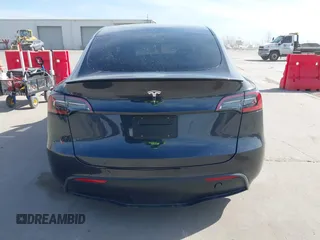 2024 Tesla Model Y with VIN 7SAYGDED9RF044789, listed as a IAAI auction lot 41817318 with Not Provided miles and . Bid and sale history available at carsss.com. Image 16.