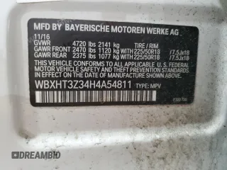2017 BMW X1 xDrive28i with VIN WBXHT3Z34H4A54811, listed as a Copart auction lot 63584405 with 92,699 mi miles and Salvage title. Bid and sale history available at DreamBid. Image 14.