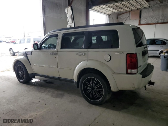 2009 Dodge Nitro SXT with VIN 1D8GU28K29W537808, listed as a Copart auction lot 79430014 with 0 mi miles and Salvage Title. Bid and sale history available at carsss.com. Image 2.