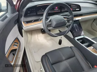 2023 Lucid Air Grand Touring z VIN 50EA1GBA4PA002253, wystawiony jako Copart lot #71451334 z przebiegiem 9758 mil mil oraz Szkody całkowita. Historia ofert i sprzedaży dostępna na DreamBid. Obrazek 8.