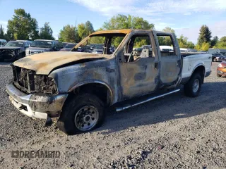 2000 Ford Super Duty F-250 XL with VIN 1FTNW21S9YEC44065, listed as a Copart auction lot 71174294 with 0 mi miles and Salvage Title. Bid and sale history available at carsss.com. Image 1.