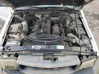 1998 GMC Sonoma z VIN 1GTCS1443W8511481, wystawiony jako Copart lot #54587395 z przebiegiem 104 975 mil mil oraz Szkoda całkowita • Salvage title. Historia ofert i sprzedaży dostępna na DreamBid. Obrazek 11.