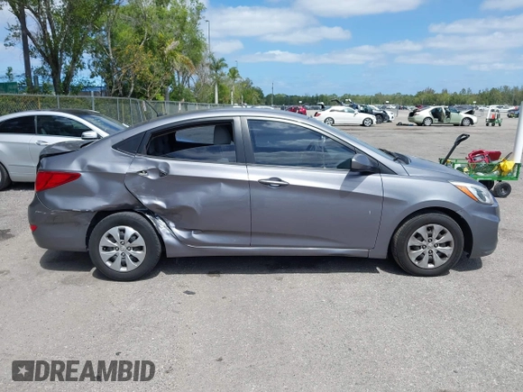 2015 Hyundai Accent GLS with VIN KMHCT4AE8FU861963, listed as a IAAI auction lot 42161059 with 132,629 mi miles and . Bid and sale history available at DreamBid. Image 14.