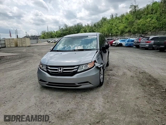 2016 Honda Odyssey SE with VIN 5FNRL5H31GB109718, listed as a Copart auction lot 54689915 with 48,933 mi miles and Salvage Title. Bid and sale history available at DreamBid. Image 14.