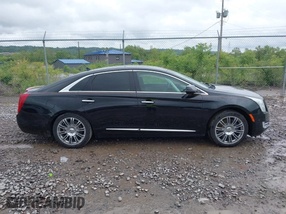 2014 Cadillac XTS Luxury with VIN 2G61M5S32E9231544, listed as a IAAI auction lot 42340088 with 74,518 mi miles and . Bid and sale history available at DreamBid. Image 13.