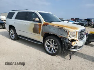 2016 GMC Yukon SLT with VIN 1GKS1BKC2GR248172, listed as a Copart auction lot 53146144 with 125,968 mi miles and Salvage Title. Bid and sale history available at carsss.com. Image 4.
