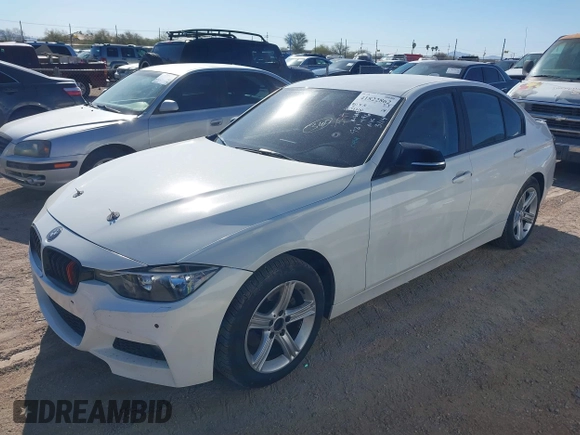 2014 BMW 3 Series 328i xDrive with VIN WBA3B3C56EJ981496, listed as a IAAI auction lot 41822862 with 137,700 mi miles. Bid and sale history available at carsss.com. Image 2.