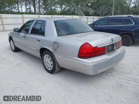 2004 Mercury Grand Marquis GS z VIN 2MEFM74W04X669087, wystawiony jako IAAI lot #42090394 z przebiegiem 172 008 mil mil oraz . Historia ofert i sprzedaży dostępna na DreamBid. Obrazek 3.