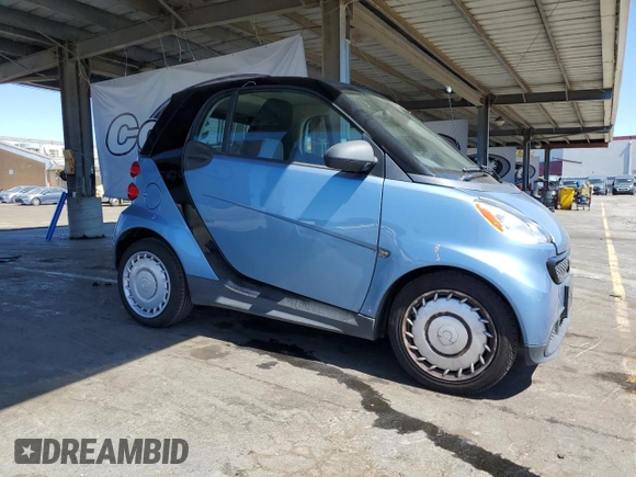 2014 Smart fortwo Pure with VIN WMEEJ3BA6EK783848, listed as a Copart auction lot 58244595 with 26,131 mi miles and Clean title. Bid and sale history available at DreamBid. Image 4.