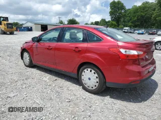 2012 Ford Focus SE with VIN 1FAHP3F29CL260334, listed as a Copart auction lot 60938445 with 166,806 mi miles and Salvage title. Bid and sale history available at DreamBid. Image 2.