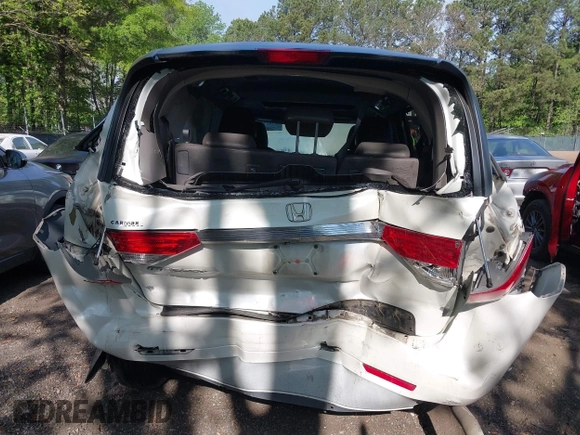 2014 Honda Odyssey EX-L with VIN 5FNRL5H63EB064854, listed as a IAAI auction lot 42102704 with 148,536 mi miles and . Bid and sale history available at carsss.com. Image 16.