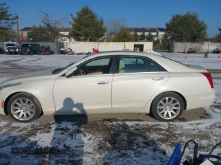 2014 Cadillac CTS Luxury RWD with VIN 1G6AR5SXXE0141931, listed as a IAAI auction lot 41352385 with 162,612 mi miles. Bid and sale history available at carsss.com. Image 14.
