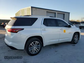 2023 Chevrolet Traverse High Country with VIN 1GNEVNKWXPJ334098, listed as a Copart auction lot 84103304 with 10,977 mi miles and Salvage title. Bid and sale history available at DreamBid. Image 3.