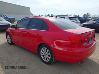 2014 Volkswagen Jetta Sedan SE w/Connectivity with VIN 3VWD07AJ8EM433021, listed as a IAAI auction lot 41695648 with 186,984 mi miles. Bid and sale history available at carsss.com. Image 3.