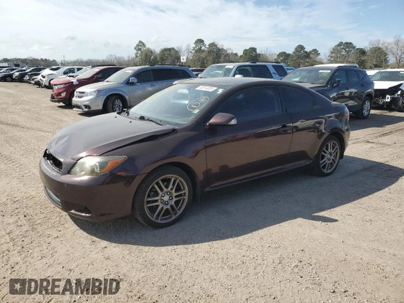 2010 Scion tC with VIN JTKDE3B75A0311156, listed as a Copart auction lot 46814055 with 104,623 mi miles and Salvage Title. Bid and sale history available at carsss.com. Image 1.