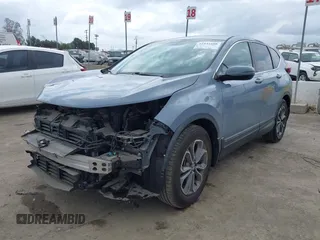 2020 Honda CR-V EX with VIN 7FARW1H58LE003895, listed as a IAAI auction lot 41841608 with 56,757 mi miles and . Bid and sale history available at carsss.com. Image 2.