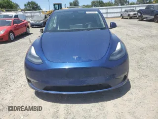 2022 Tesla Model Y Performance z VIN 7SAYGDEF6NF337710, wystawiony jako Copart lot #60200985 z przebiegiem 101 168 mil mil oraz Szkoda całkowita • Salvage title. Historia ofert i sprzedaży dostępna na DreamBid. Obrazek 5.