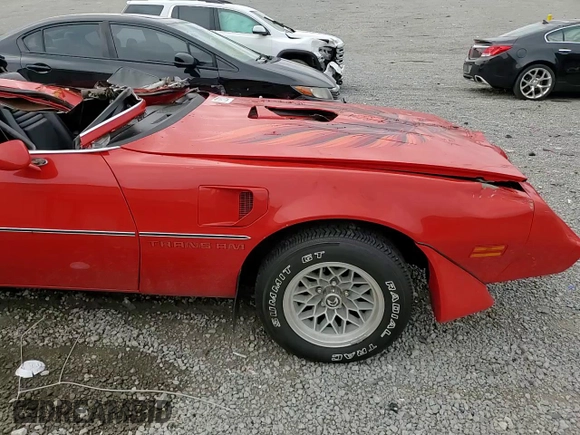 1979 Pontiac Firebird z VIN 2W87Z9N112021, wystawiony jako Copart lot #67852034 z przebiegiem Nie podano mil oraz Nie do naprawy • Non repairable. Historia ofert i sprzedaży dostępna na DreamBid. Obrazek 11.