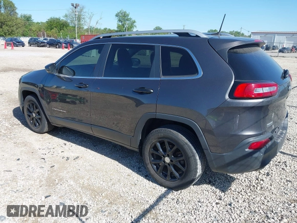 2016 Jeep Cherokee Latitude z VIN 1C4PJLCB5GW264607, wystawiony jako IAAI lot #42275637 z przebiegiem 64 264 mil mil oraz . Historia ofert i sprzedaży dostępna na DreamBid. Obrazek 3.