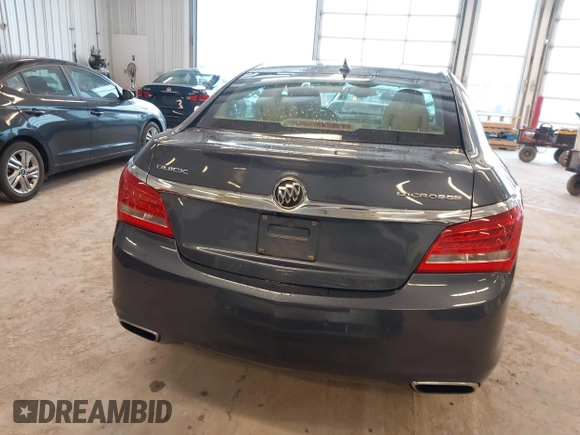 2014 Buick LaCrosse Leather with VIN 1G4GB5G39EF132695, listed as a IAAI auction lot 41728596 with 124,639 mi miles and . Bid and sale history available at DreamBid. Image 16.