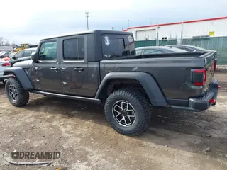 2024 Jeep Gladiator Rubicon z VIN 1C6JJTBG5RL110669, wystawiony jako IAAI lot #41694630 z przebiegiem 1 189 mil mil oraz . Historia ofert i sprzedaży dostępna na DreamBid. Obrazek 14.
