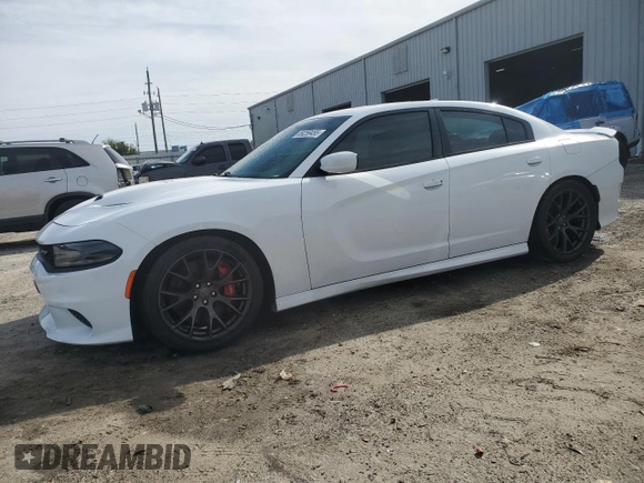 2015 Dodge Charger SRT Hellcat z VIN 2C3CDXL92FH905692, wystawiony jako Copart lot #89259455 z przebiegiem 85 836 mil mil oraz Czysty tytuł • Clean title. Historia ofert i sprzedaży dostępna na DreamBid. Obrazek 1.