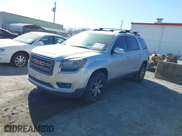 2014 GMC Acadia SLT z VIN 1GKKRSKD4EJ191809, wystawiony jako IAAI lot #41893345 z przebiegiem Nie podano mil oraz . Historia ofert i sprzedaży dostępna na DreamBid. Obrazek 2.