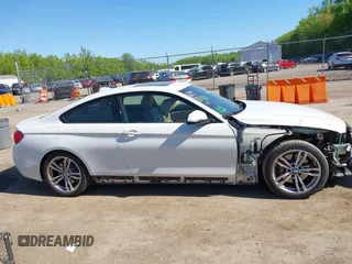 2014 BMW 4 Series 435i z VIN WBA3R1C51EK192103, wystawiony jako IAAI lot #42127351 z przebiegiem 99 023 mil mil oraz . Historia ofert i sprzedaży dostępna na DreamBid. Obrazek 13.