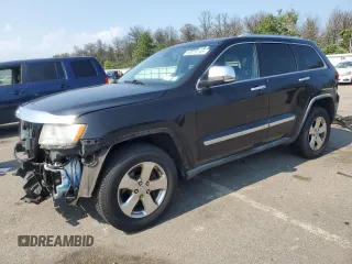2011 Jeep Grand Cherokee Limited with VIN 1J4RR5GG3BC566114, listed as a Copart auction lot 63016145 with 144,405 mi miles and Salvage title. Bid and sale history available at DreamBid. Image 1.