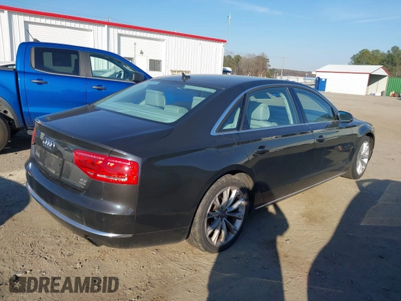 2012 Audi A8 L with VIN WAURVAFD1CN020870, listed as a IAAI auction lot 41701012 with 89,338 mi miles. Bid and sale history available at carsss.com. Image 4.