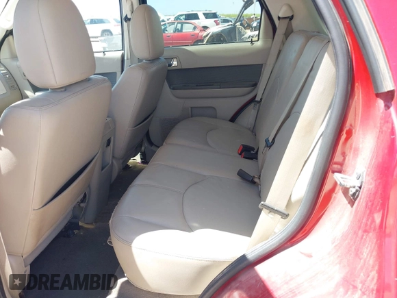 2011 Mercury Mariner Premier with VIN 4M2CN8HG3BKJ08774, listed as a IAAI auction lot 42007038 with 127,551 mi miles and . Bid and sale history available at DreamBid. Image 8.